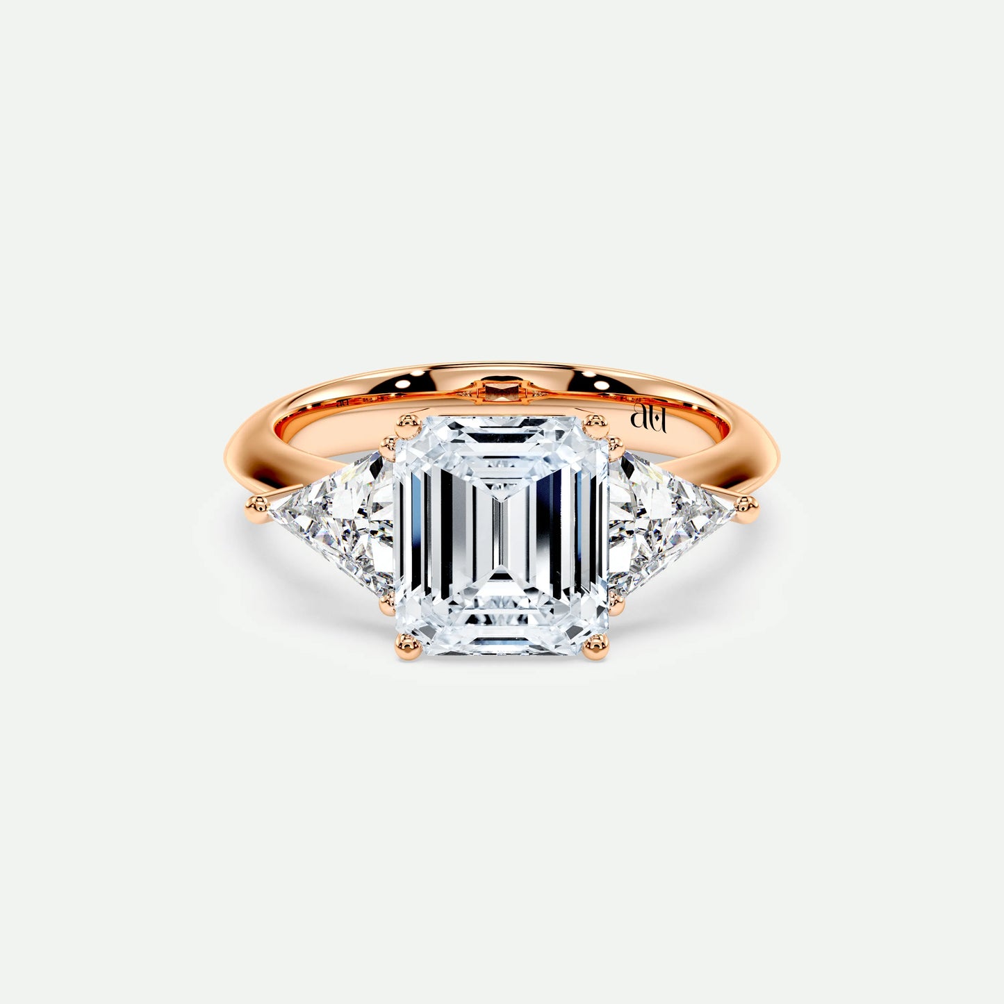 PRISM – 4 Claw Trilogy with Trillion Side Stones on a Plain Band
