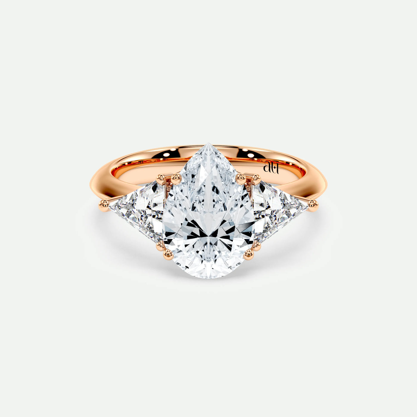 PRISM – 4 Claw Trilogy with Trillion Side Stones on a Plain Band