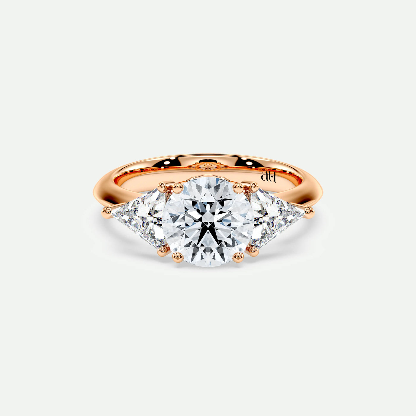 PRISM – 4 Claw Trilogy with Trillion Side Stones on a Plain Band