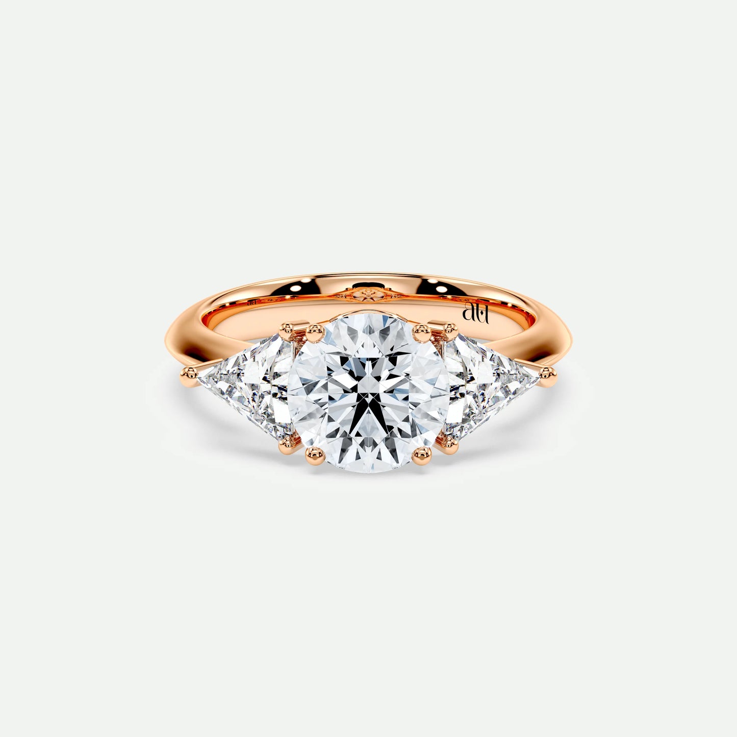 PRISM – 4 Claw Trilogy with Trillion Side Stones on a Plain Band
